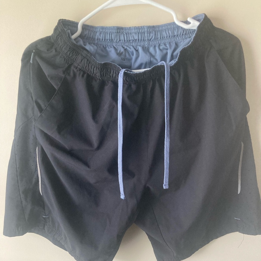 Black and blue swim trunks